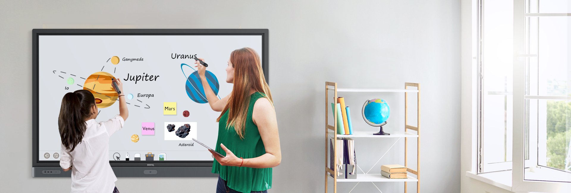 Engaged student enjoying the use of BenQ interactive flat panel in the classroom.